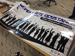 Women write resistance banner